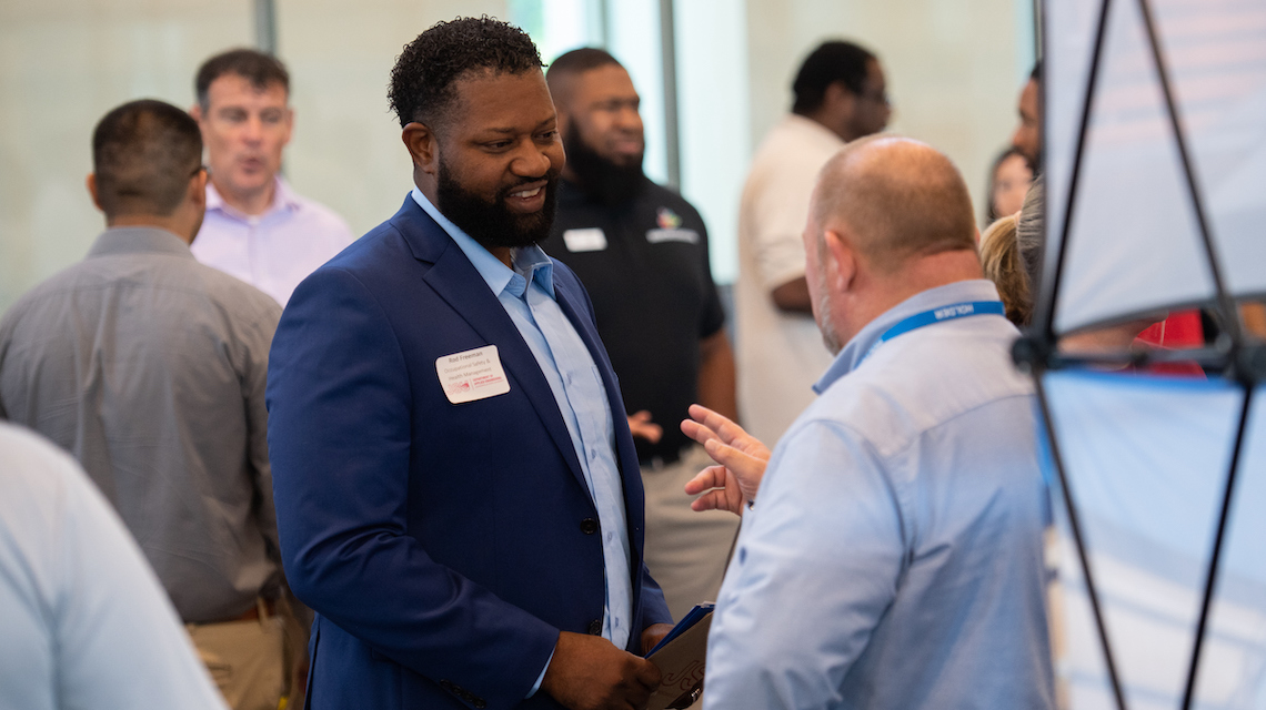 Students and employers at career fair